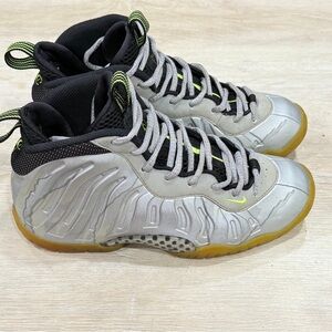 Nike Kids Silver and Black Sneakers with Gold Accents